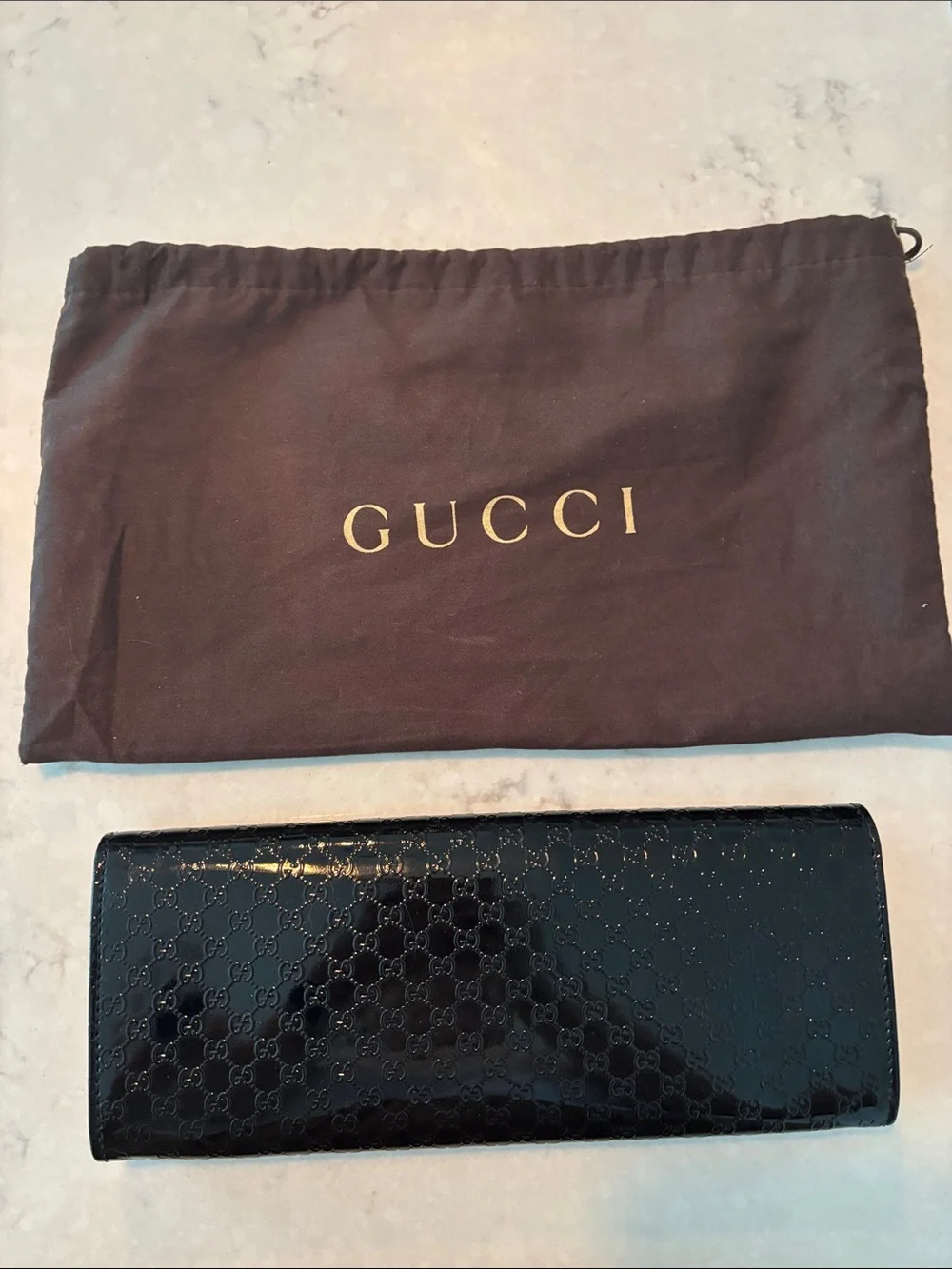 Gucci Black Patent Monogram clutch
